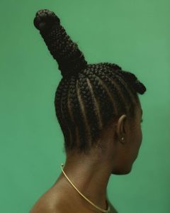 Picture of an african female with cultural west african cornrows