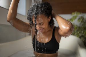 Black female washing her hair 